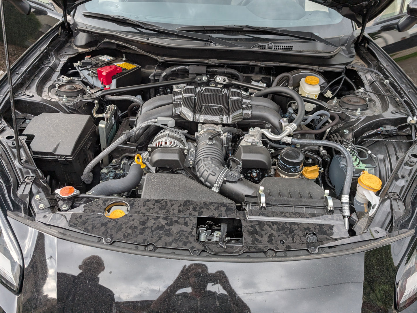 GreenFuchs | Supporto per serratura del cofano motore completamente in carbonio | GR86 e BRZ II